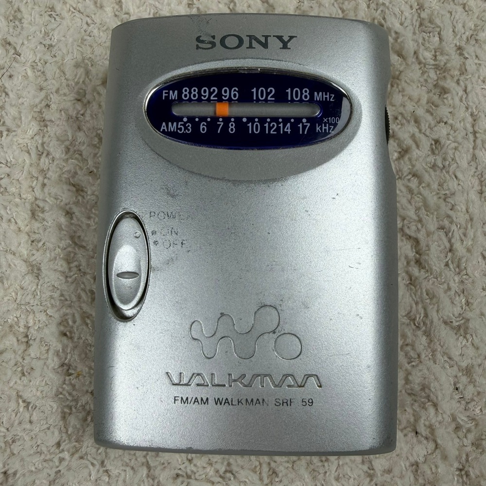 Sony Walkman SRF-59 Portable AM/FM Radio Silver Handheld Analog Tuner Belt Clip